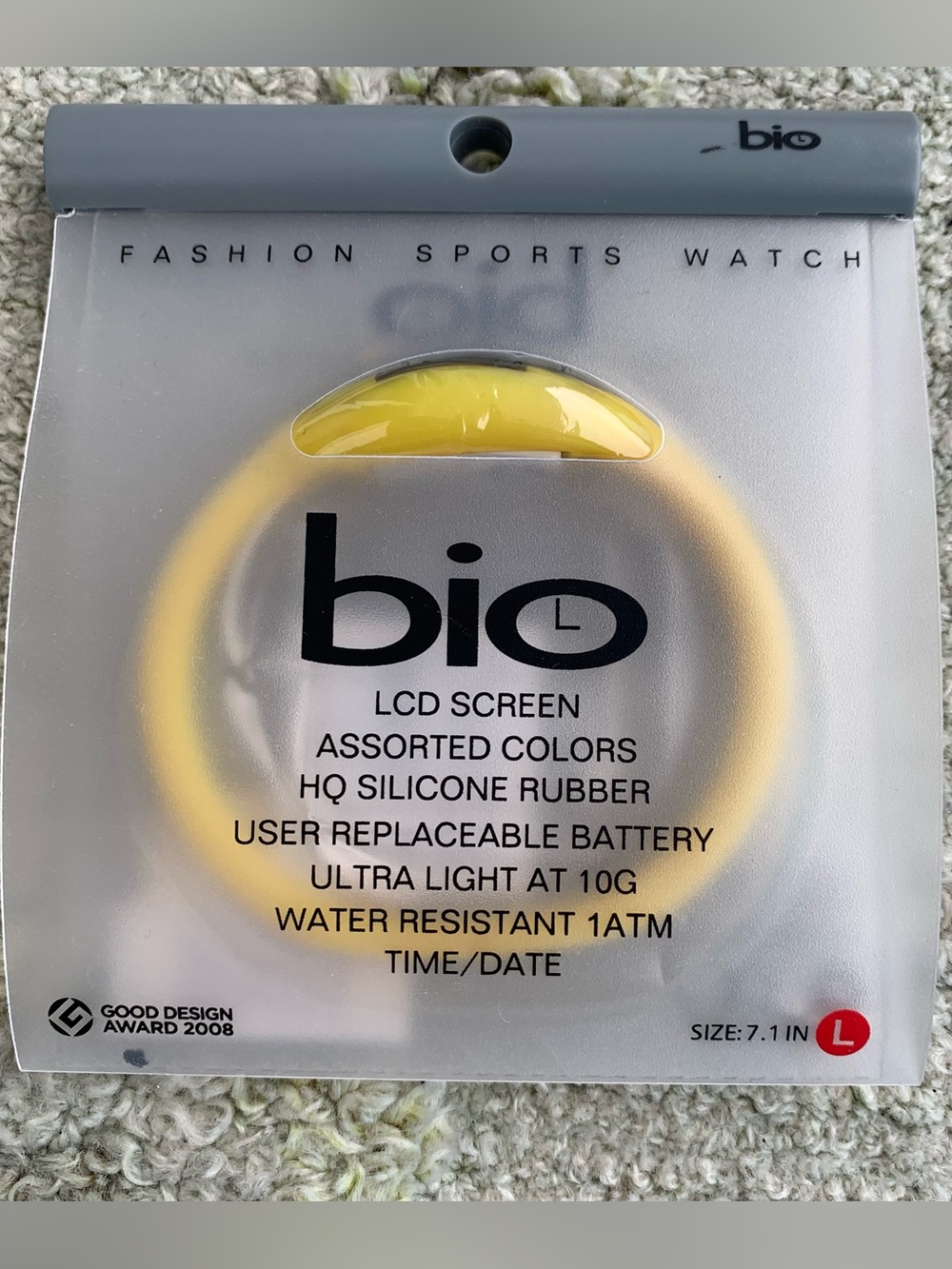yellow Bio digital sports watch inside its translucent packaging